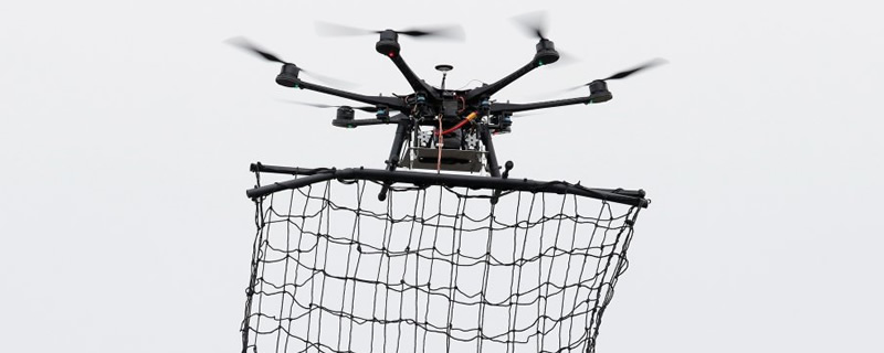 How do Tokyo Police Catch Drones? With a huge net!